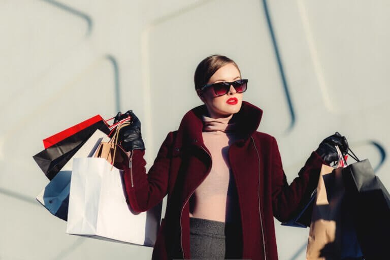 photo of woman on a shopping spree impulse buying